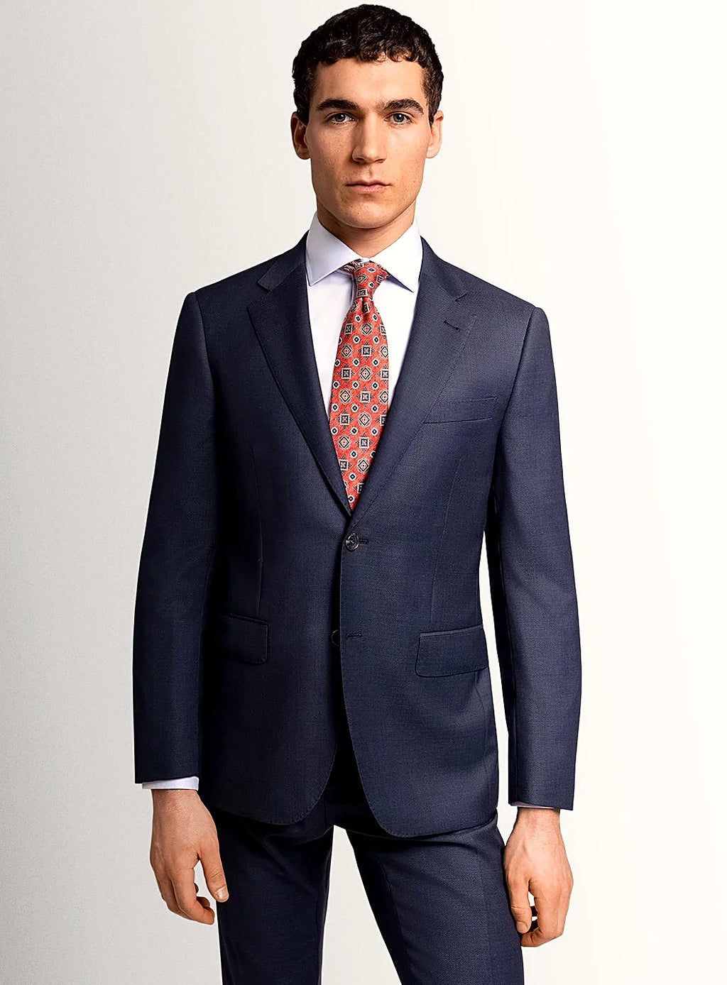 Navy birdseye jacket worn with a plain shirt