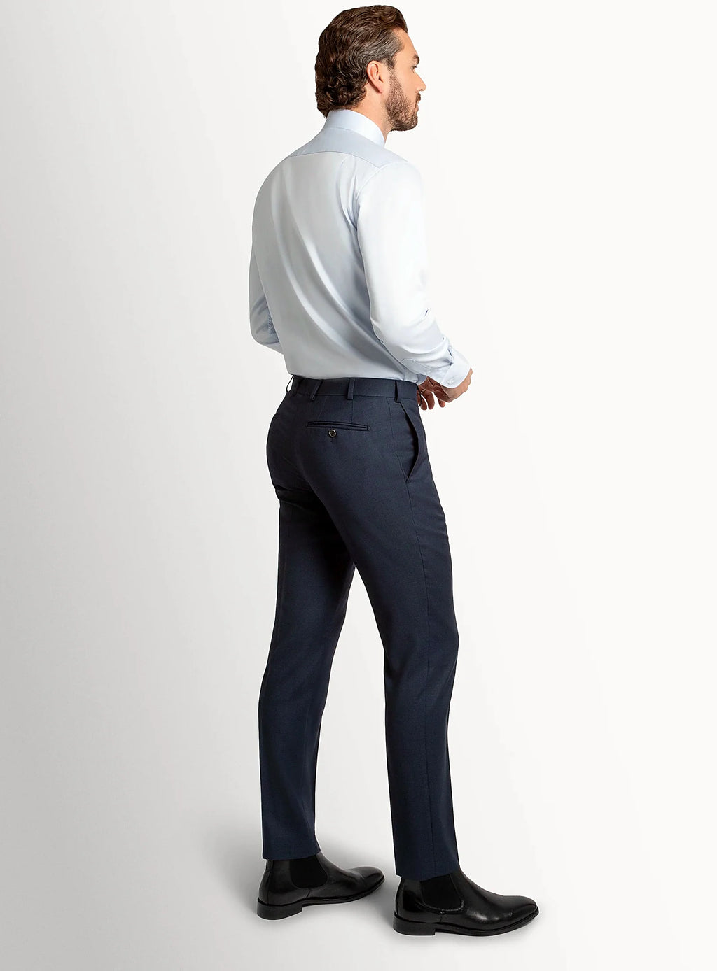 Waistband and front detail of the navy trousers