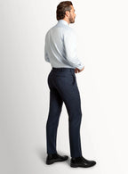 Waistband and front detail of the navy trousers