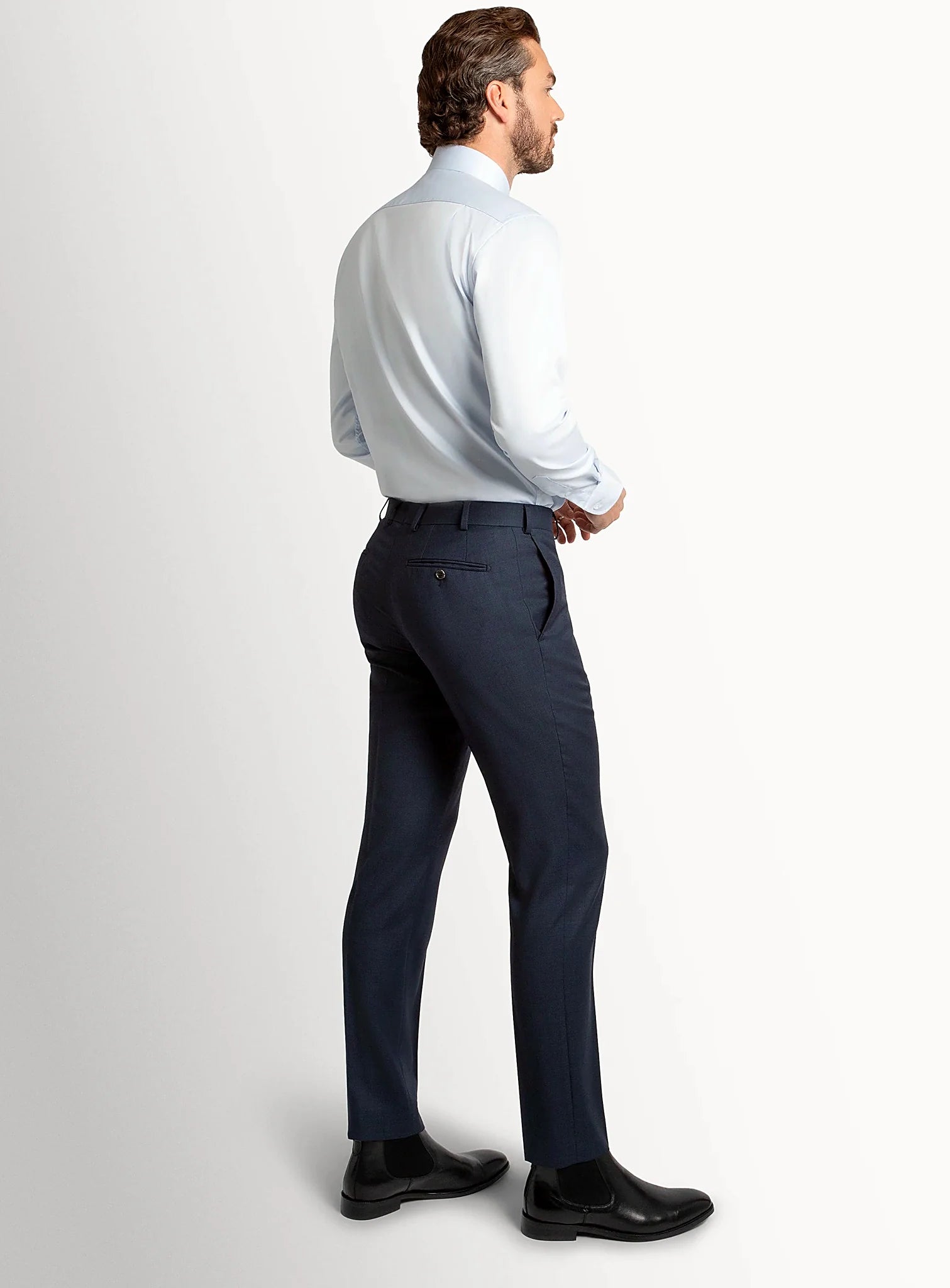 Waistband and front detail of the navy trousers