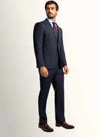 Side angle of the clean navy jacket silhouette