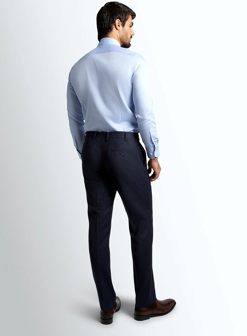 Waistband and front detail of the navy trousers