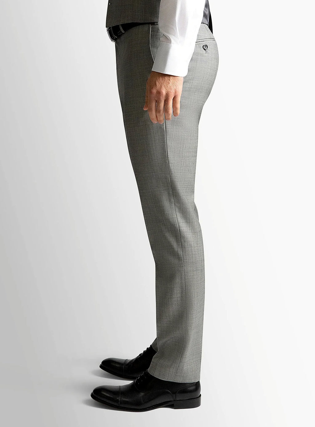 Side view of the tailored grey trouser leg