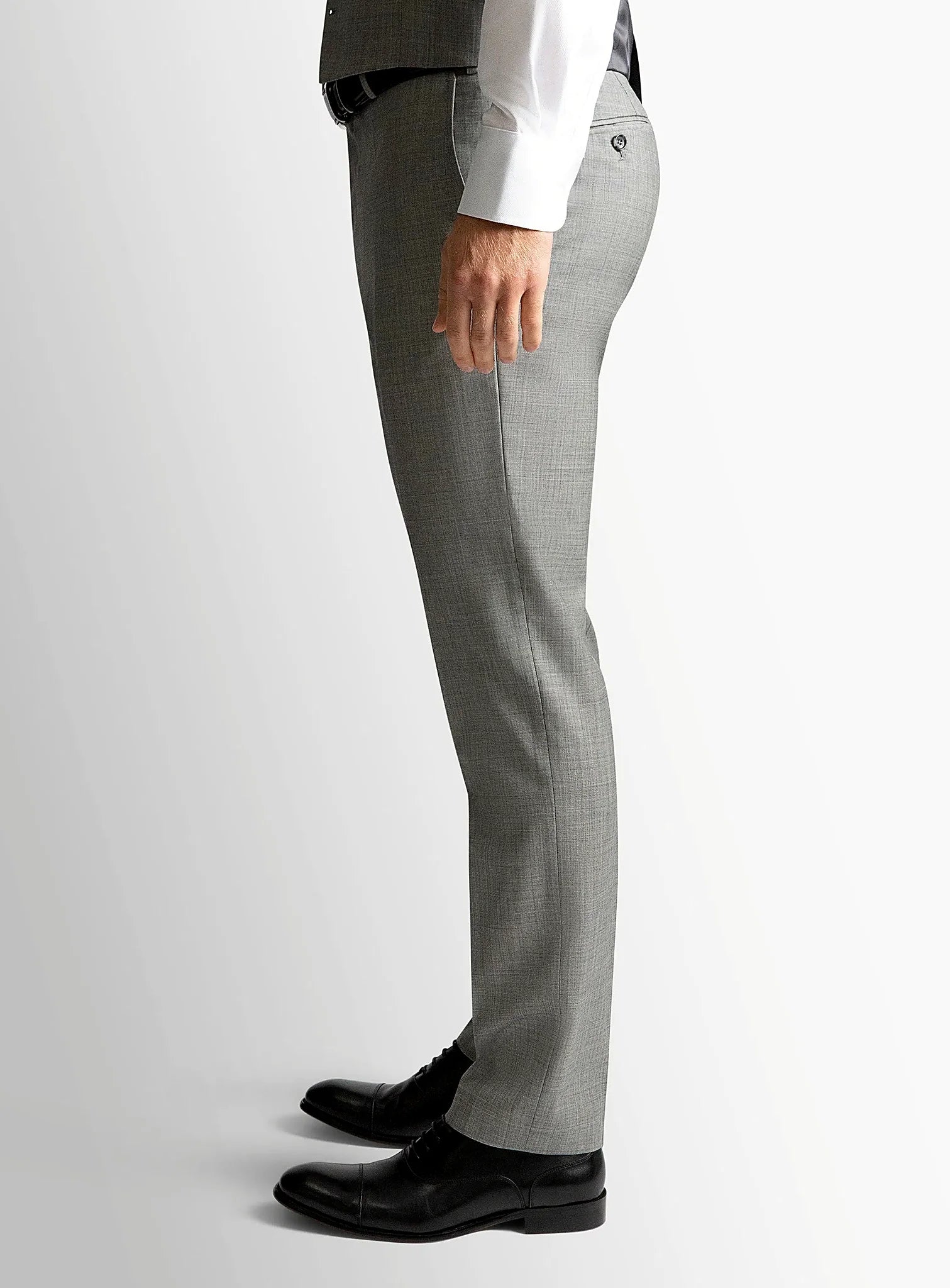 Side view of the tailored grey trouser leg