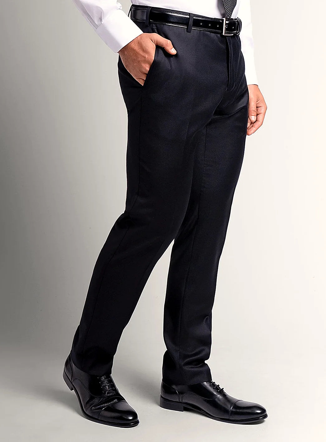 Waistband and front detail of the black trousers