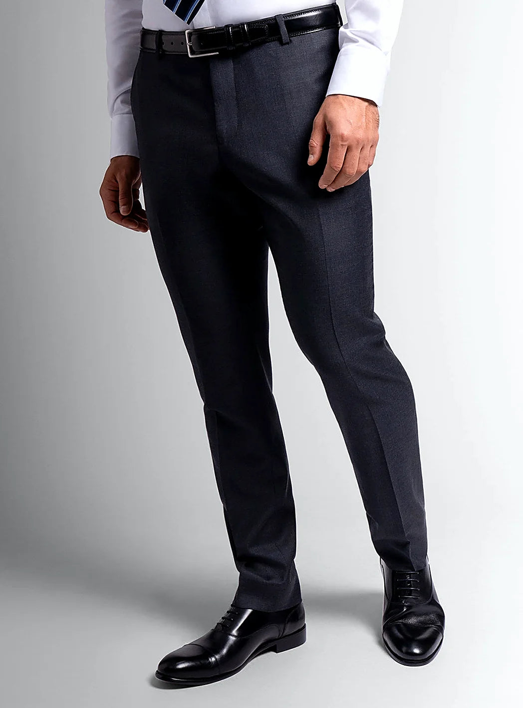 Charcoal twill trousers shown full length on a model