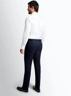 Waistband and front detail of the navy trousers