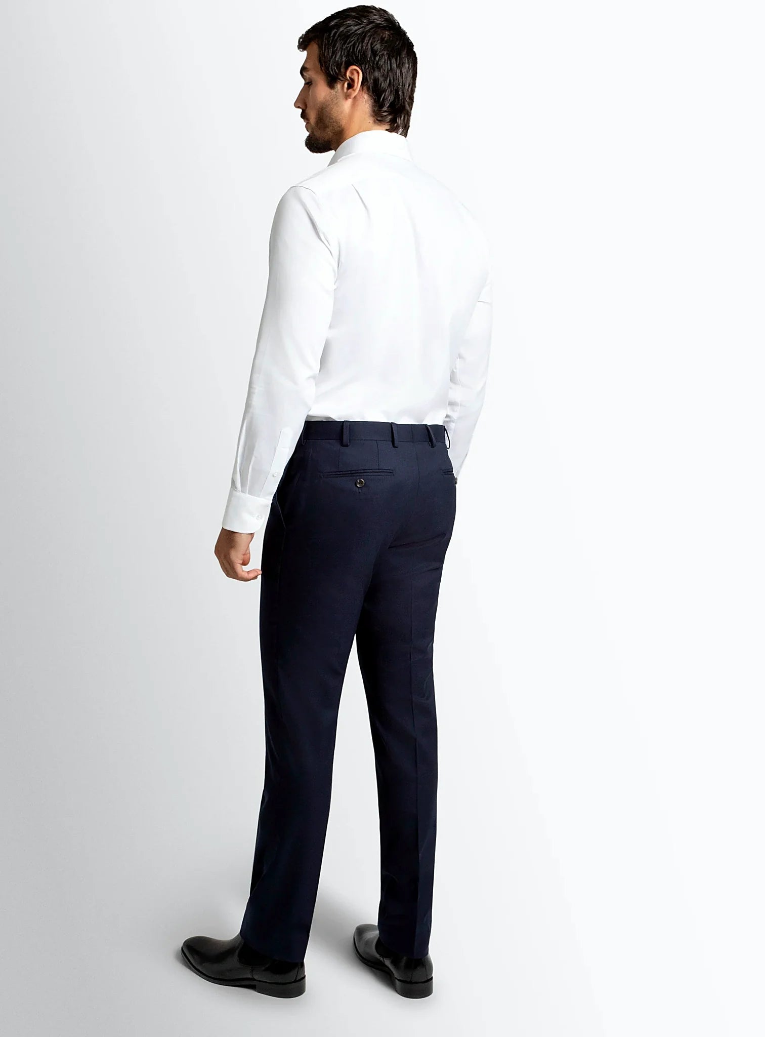 Waistband and front detail of the navy trousers