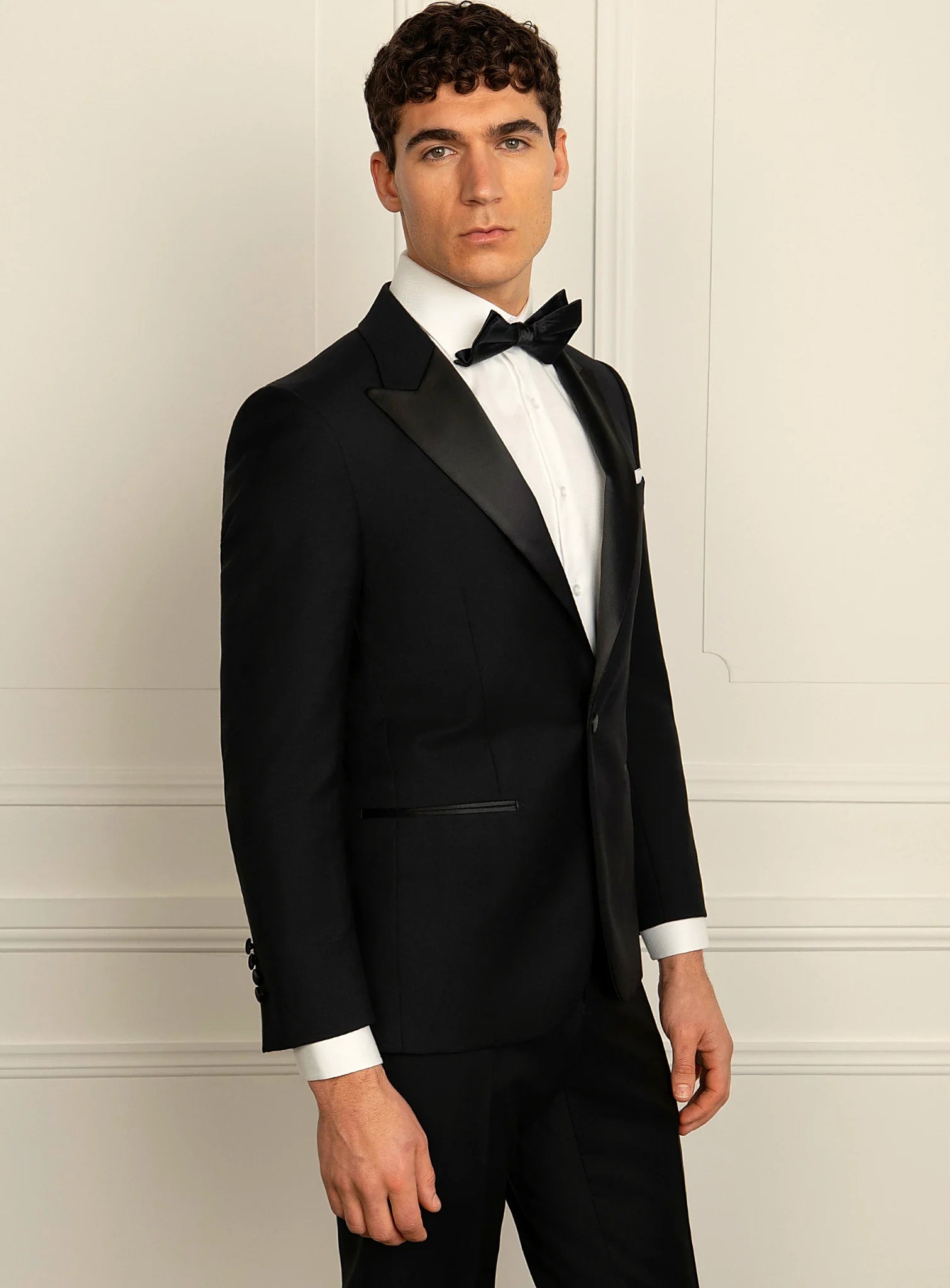 Collar and lapel detail of the black dinner jacket