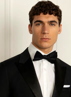 Close view of the satin facing on the peak lapel