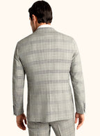 Wide notch lapel detail on the grey jacket