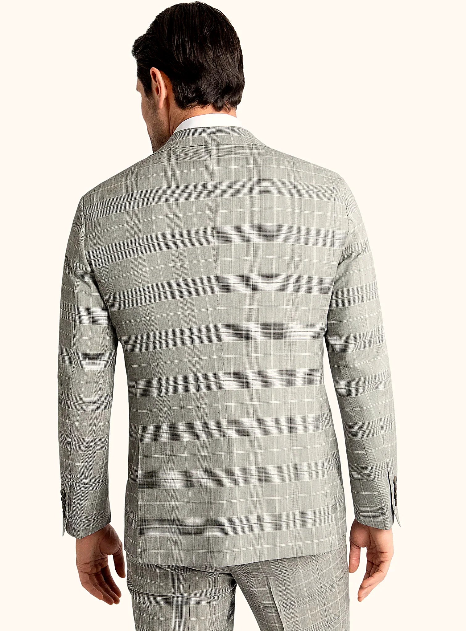 Wide notch lapel detail on the grey jacket