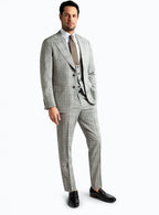 Three-quarter view of the checked jacket and trousers