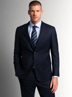 Navy textured suit shown full length on a model