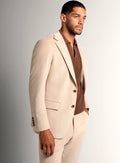 Sand beige babycord jacket worn open over a shirt