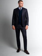 Three-quarter view of the navy jacket and trousers