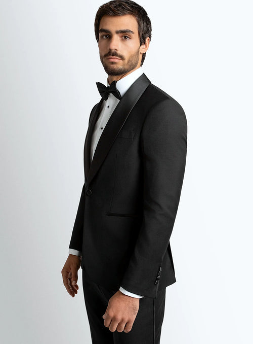 Black tuxedo worn full length with a formal shirt
